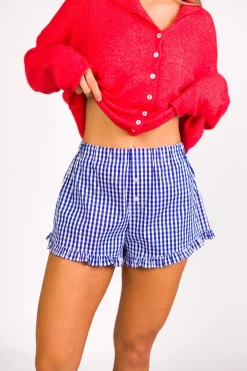 Fashion Worth Collective Georgia Gingham Ruffle Hem Shorts in Blue