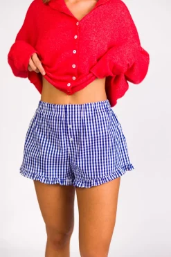 Fashion Worth Collective Georgia Gingham Ruffle Hem Shorts in Blue