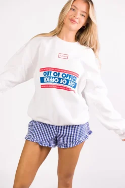 Fashion Worth Collective Georgia Gingham Ruffle Hem Shorts in Blue