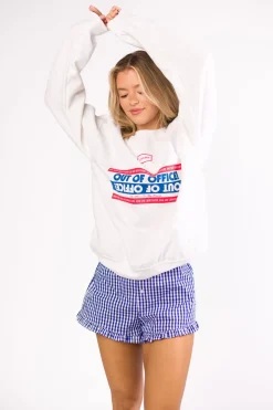 Fashion Worth Collective Georgia Gingham Ruffle Hem Shorts in Blue