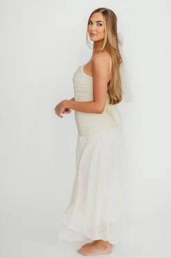 Fashion Worth Collective Rosie Ruched Maxi Dress With Bow Back Detail in Cream
